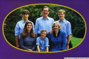 ["The 1990 Rockefeller family holiday card reads, \"May this holiday season bring you peace and happiness.\" Pictured are Jay, Sharon, Valerie, John, Justin, and Charles Rockefeller. On the back is an unofficial seal of the United States Senate."]%
