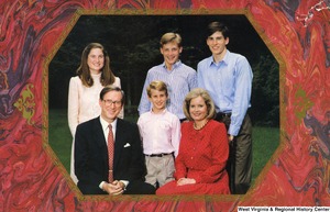 ["The 1988 Rockefeller family holiday card reads, \"Peace and joy.\" Pictured are Jay, Sharon, Valerie, John, Charles, and Justin Rockefeller."]%