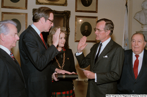 ["Photograph of Vice President George H. W. Bush administering the oath to Senator John D. (Jay) Rockefeller."]%