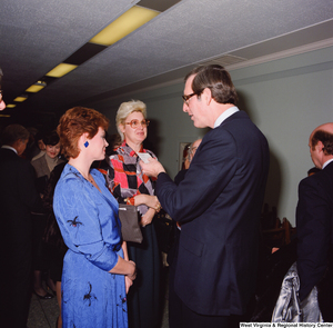 ["Unidentified supporters speak with Senator John D. (Jay) Rockefeller following his Senate Swearing-In Ceremony."]%