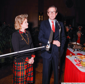 ["Senator John D. (Jay) Rockefeller and his wife Sharon address guests at a banquet following his Senate Swearing-In Ceremony."]%