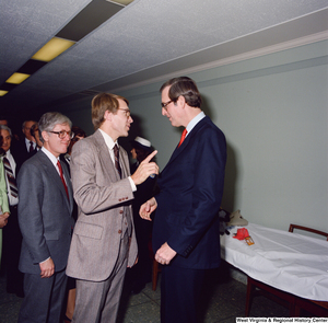 ["Senator John D. (Jay) Rockefeller and his wife Sharon talk with supporters after his Senate Swearing-In Ceremony."]%