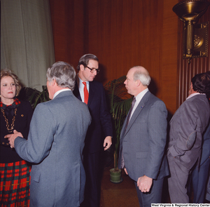 ["Unidentified supporters speak with Senator John D. (Jay) Rockefeller and Sharon Rockefeller after the Senate Swearing-In Ceremony."]%