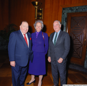 ["Former Senator from West Virginia Jennings Randolph stands with two unidentified individuals at the Senate Swearing-In Ceremony of Senator John D. (Jay) Rockefeller."]%