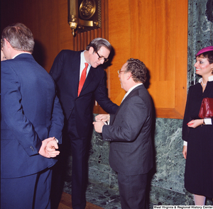 ["Senator John D. (Jay) Rockefeller shakes the hand of an unidentified supporter at the Senate Swearing-In Ceremony."]%