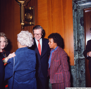 ["Senator John D. (Jay) Rockefeller greets unidentified supporters at the Senate Swearing-In Ceremony."]%