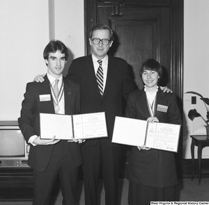 ["Senator John D. (Jay) Rockefeller poses with the 1985 United States Senate Youth Program delegates from West Virginia. Created in 1962 by Senate Resolution 324, the annual program gives two high school students from each state the opportunity to participate in a week-long immersive experience in Washington, D.C. that focuses on public service, leadership, and learning about the interrelated components of the federal government."]%