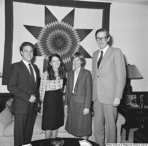 ["Senator John D. (Jay) Rockefeller meets with an unidentified group in his Washington office."]%