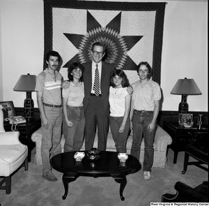 ["An unidentified group poses for a photograph with Senator John D. (Jay) Rockefeller in his Washington office."]%