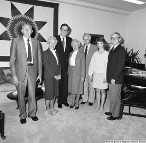 ["An unidentified group stands for a photograph with Senator John D. (Jay) Rockefeller in his Washington office."]%