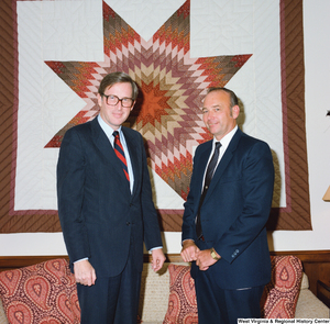 ["This color photograph shows Senator John D. (Jay) Rockefeller standing with the superintendent of the Monongahela National Forest in his office."]%