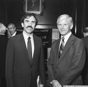 ["WVU President Neil S. Bucklew is photographed with Representative Bob Wise at an event in Washington hosted by the National Capital Chapter of the West Virginia University Alumni Association."]%