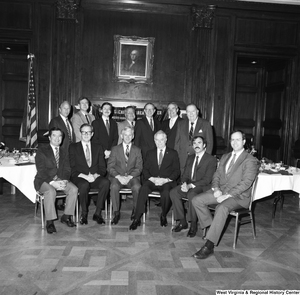 ["The group attending the West Virginia University Alumni Association event in Washington, including Congressman Nick Rahall, Senator John D. (Jay) Rockefeller, WVU President Neil S. Bucklew, and Senator Robert C. Byrd, gather for a photograph."]%