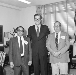 ["Senator John D. (Jay) Rockefeller stands for a photograph in his office with Joseph A. Caruso and Robert Moore of the National Rural Electric Cooperative Association."]%