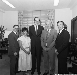 ["Senator John D. (Jay) Rockefeller stands in his office for a photograph with four representatives from the West Virginia Education Fund."]%