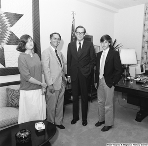 ["Senator John D. (Jay) Rockefeller is photographed with two of his children, Valerie and Jamie, and Carl Sagan in his Washington office."]%