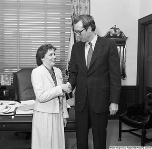 ["Senator John D. (Jay) Rockefeller shakes hands with a participant in A Presidential Classroom for Young Americans. This program gives young adults hands-on civic-learning experiences with the federal government."]%