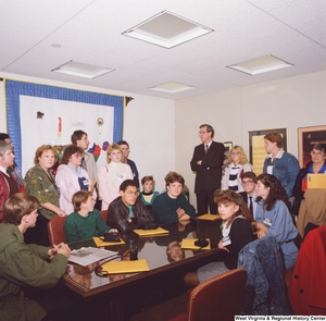 ["This color photograph shows Senator John D. (Jay) Rockefeller standing with a group of students participating in Close Up in his office."]%