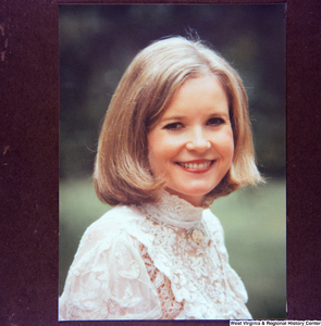 ["This image is of a photograph of a portrait of Sharon Rockefeller."]%