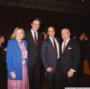 ["Senator John D. (Jay) Rockefeller and Sharon Rockefeller stand with staff members during an event in the Senate."]%