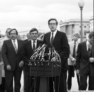 ["Senator John D. (Jay) Rockefeller speaks at an alternative motor fuels event outside the Senate."]%