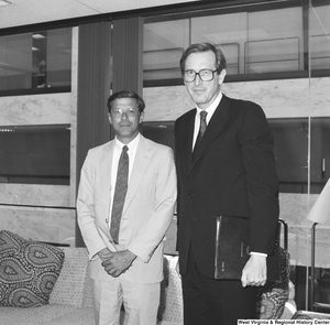 ["Senator John D. (Jay) Rockefeller stands next to Dr. Bill Neal of West Virginia University."]%