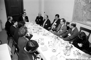 ["Senator John D. (Jay) Rockefeller sits with representatives from West Virginia hospitals at a breakfast event in the Senate."]%