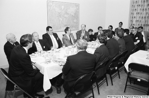 ["Senator John D. (Jay) Rockefeller listens to a representative from West Virginia University Hospitals speak during a breakfast reception in the Senate."]%