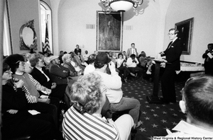 ["Senator John D. (Jay) Rockefeller talks to a group of West Virginians about black lung disease."]%