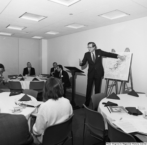 ["Senator John D. (Jay) Rockefeller points to a map of the Appalachian Region as he speaks at an event."]%