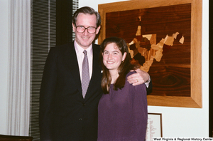 ["Senator John D. (Jay) Rockefeller hugs his daughter Valerie in his office."]%