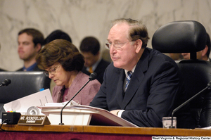 ["Senator John D. (Jay) Rockefeller and Senate Dianne Feinstein sit at a Senate committee hearing on intelligence."]%