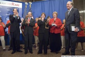 ["Senator John D. (Jay) Rockefeller stands with Senators Ron Wyden and Debbie Stabenow after a Standing Together for Medicare press event."]%