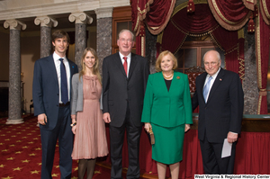 ["Senator John D. (Jay) Rockefeller stands with his wife, one of his sons, and Vice President Dick Cheney after his Senate Swearing-In Ceremony."]%