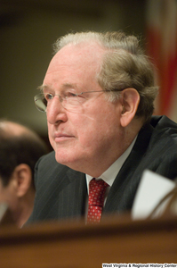 ["Senator John D. (Jay) Rockefeller sits at an intelligence committee hearing."]%