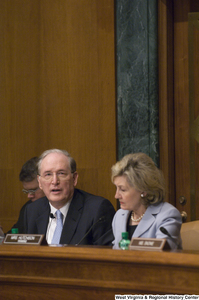 ["Senators John D. (Jay) Rockefeller and Kay Hutchison sit at a Commerce Committee hearing."]%