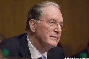 ["Senator John D. (Jay) Rockefeller listens intently to testimony at a Commerce Committee hearing."]%