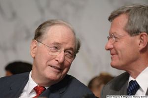 ["Senators John D. (Jay) Rockefeller and Max Baucus talk during an executive session to consider new health care reform legislation."]%