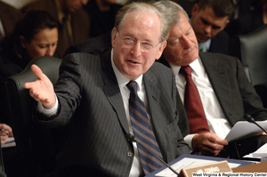 ["Senator John D. (Jay) Rockefeller gestures to someone during a hearing about health care reform legislation in the Senate Finance Committee."]%