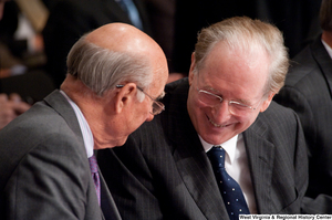 ["Senators John D. (Jay) Rockefeller and Pat Roberts speak during an open executive session to consider healthcare legislation."]%