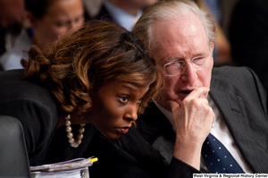 ["Senator John D. (Jay) Rockefeller speaks with an adviser during a Finance Committee executive session about health care reform."]%