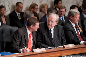 ["Senator John D. (Jay) Rockefeller speaks with Senator Conrad Kent during an executive session about health care reform."]%