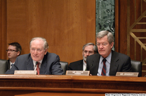 ["Senators John D. (Jay) Rockefeller and Max Baucus listen to testimony during a Intelligence Committee hearing."]%