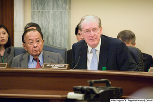 ["Senators John D. (Jay) Rockefeller and Daniel Inouye sit at a Commerce Committee hearing."]%