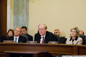 ["Senators John D. (Jay) Rockefeller, Kay Hutchison, and Bill Nelson listen to testimony at a Commerce Committee hearing."]%