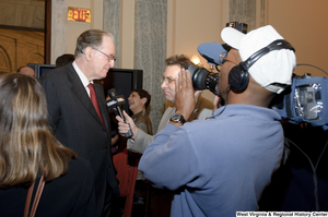 ["Senator John D. (Jay) Rockefeller speaks with press at an event for Senator Joe Manchin."]%