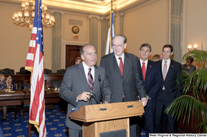 ["West Virginia Governor Earl Ray Tomblin speaks at a swearing-in event for Senator Joe Manchin."]%