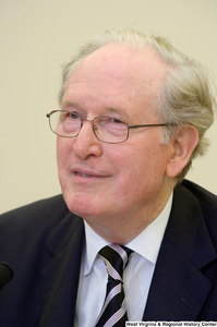 ["Senator John D. (Jay) Rockefeller sits at a Commerce Committee hearing."]%