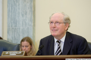 ["Senator John D. (Jay) Rockefeller sits at a Commerce Committee hearing."]%