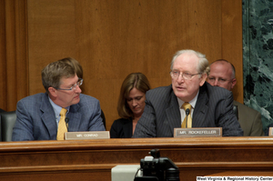 ["Senators John D. (Jay) Rockefeller and Kent Conrad sit at a Finance Committee hearing."]%